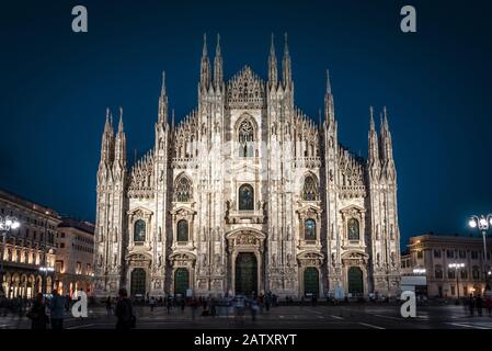 Milan Cathedral or Duomo di Milano at night, Italy. It is a main tourist attraction of the Milan city. Old Gothic architecture of Milan in evening. Fr Stock Photo