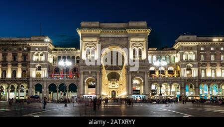 Galleria Vittorio Emanuele II at night, Milan, Italy. It is a famous landmark of Milan. Panorama of the Piazza del Duomo in the Milan center at dusk. Stock Photo