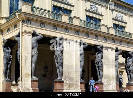 ST PETERSBURG, RUSSIA - JUNE 14, 2014: Portico of the New Hermitage with atlantes. The Hermitage is one of the largest and oldest museums in the world Stock Photo