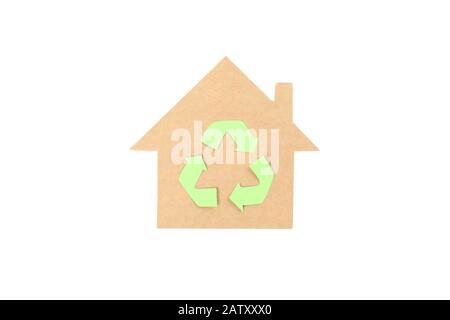 Cardboard house with recycle sign isolated on white background Stock Photo