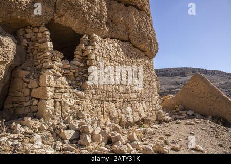 abandoned very old stone buildings in the Tafila area of Jordan Stock Photo