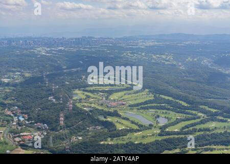 Sunny aerial sky landscape from and airplane window seat over Taiwan Stock Photo