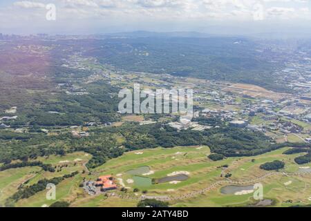 Sunny aerial sky landscape from and airplane window seat over Taiwan Stock Photo