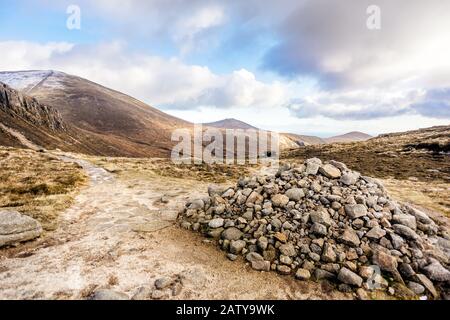 Mountain trail leading to the highest mountains. Sport and active life ...