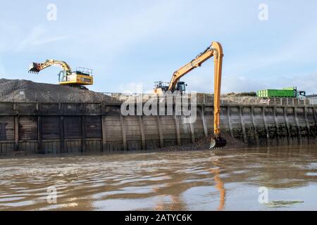 Littlehampton, West Sussex, UK, February 05, 2020. Dredging The River Arun with large excavators and earth moving equipment. Stock Photo