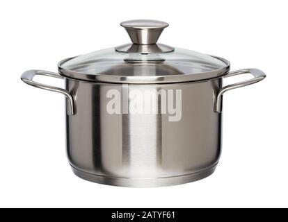 New metal pan with glass lid isolated on white background. Modern kitchen utensils with thick bottom for electric, infrared, induction or gas stoves. Stock Photo