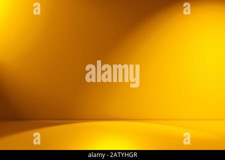 Yellow empty Studio room for product placement or as a design template with wall angle in a full frame view Stock Photo