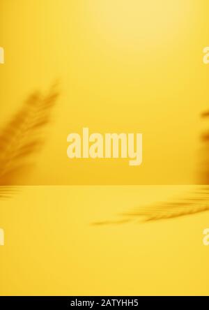 Two palm fronds casting shadows on a yellow wall with copy space as a design template or tropical background in a full frame view. Minimal summer conc Stock Photo