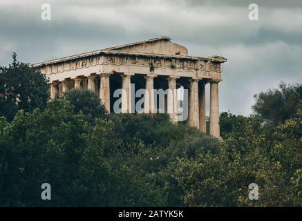 Dramatic view of the Temple of Hephaestus (Theseion) in Ancient Agora - Athens, Greece Stock Photo