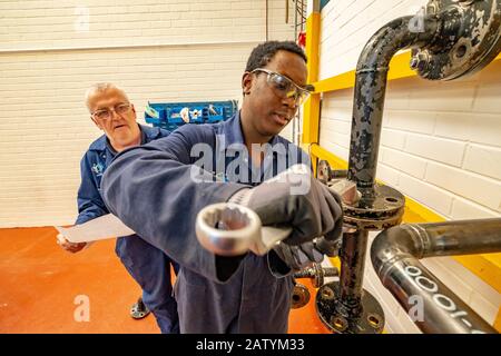Apprentice engineers training Stock Photo