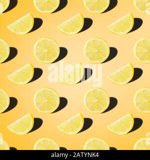 seamless food pattern with fresh slice lemon on light yellow background Stock Photo