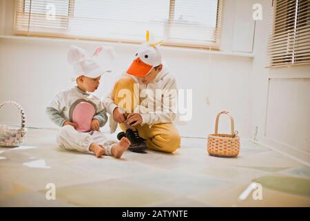 Two brothers dressed up for Easter with their Easter baskets Stock Photo