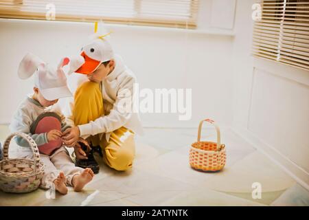 Two brothers dressed up for Easter with their Easter baskets Stock Photo