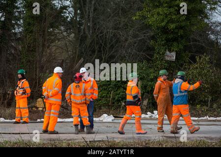 Denham, UK. 5 February, 2020. Engineers and security guards survey land cleared at Buckinghamshire Golf Club in the Colne Valley for works planned in conjunction with the HS2 high-speed rail link including the felling of ancient trees in a nature reserve on the other side of the river Colne and the construction of a Bailey bridge across the river. Environmental activists are occupying trees in Denham Country Park in an attempt to prevent or hinder the work. Credit: Mark Kerrison/Ģ����ý Live News Stock Photo