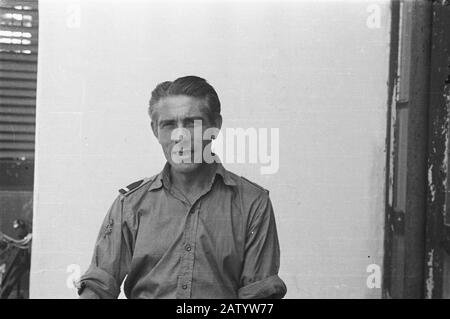 Passport IV  [Militiar with rank insignia: Adjutant of the Army Commander and sleeve logo War Volunteer] Date: 1947 Location: Indonesia Dutch East Indies Stock Photo