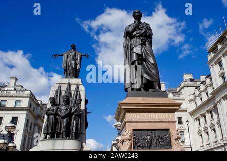 The Guards and Sidney Herbert statues, Crimean War Memorial, Waterloo Place, St James's, City of Westminster, London, England. Stock Photo