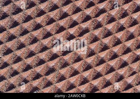 rough rusted diamond textured iron metal background Stock Photo