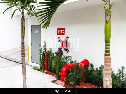 Fire Department Connection on the outside of a commercial building, for supplying emergency water to the building. Stock Photo