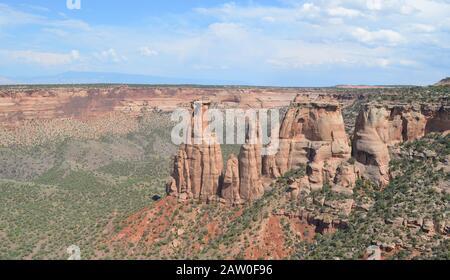 Early Summer in Colorado: Looking Out Monument Canyon at Kissing Couple Formation From Grand View Along Rim Rock Drive in Colorado National Monument Stock Photo