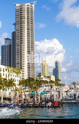 Miami Beach Florida,Marina,high rise,condominium residential apartment apartments building buildings housing,Biscayne Bay,rental jet ski,FL100919082 Stock Photo