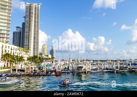 Miami Beach Florida,Marina,high rise,condominium residential apartment apartments building buildings housing,Biscayne Bay,rental jet ski,FL100919081 Stock Photo