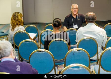 Miami Florida,James L. Knight Convention Center,Miami Financial Planning Day,free advice,guidanceal planners,speaker,seminar,empty chairs,visitors tra Stock Photo