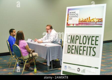 Miami Florida,James L. Knight Convention Center,Miami Financial Planning Day,free advice,guidanceal planners,man men male,woman female women,employee Stock Photo
