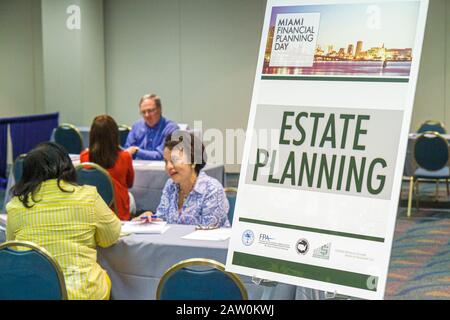 Miami Florida,James L. Knight Convention Center,Miami Financial Planning Day,free advice,guidanceal planners,sign,estate planning,woman female women,F Stock Photo