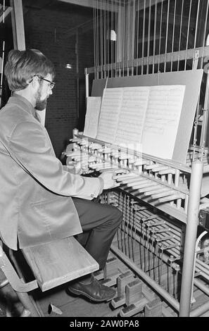 New carrillon in Grote Kerk in Dordrecht started, Arie Abbenes plays carillon Date: May 5, 1966 Location: Dordrecht Keywords: carillons, carrillons, churches Person Name: Arie Abbenes Institution Name: Great Church Stock Photo