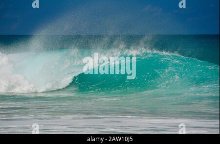 Surfers padding out to world-renowned crashing, barreling curved turquoise  waves in Banzai Pipeline on North Shore, Oahu island, Haleiwa, Hawaii, USA  Stock Photo - Alamy