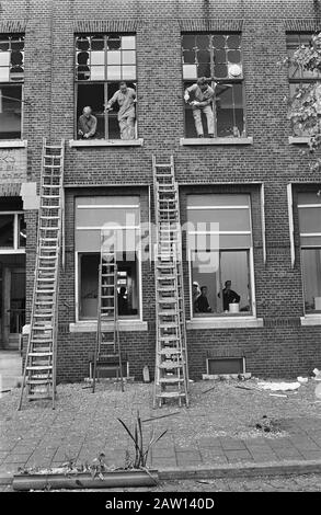 Blast Panamanian tanker Agua Clara in Schiedam. Building where windows fell Date: July 12, 1968 Location: Panama, Schiedam Keywords: buildings, accidents, shipping, ships Person Name: Agua Clara Stock Photo