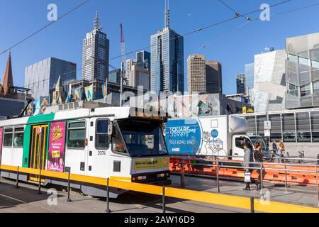 Melbourne tram and melbourne skyscrapers in the city centre,Victoria,Australia summers day