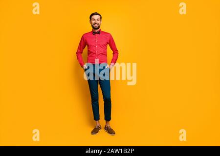 a man in a red shirt and blue pants with his hand out Stock Photo by Icons8