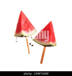 Slice of watermelon with splash of pink juice. Stock Photo