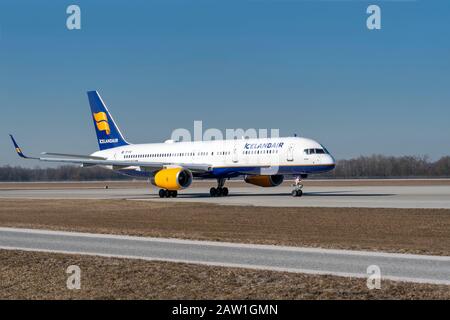 Munich, Germany - February 27. 2019 : Icelandair Boeing 757-208 Katla with the aircraft registration number TF-FIV is taxiing for take off on the nort