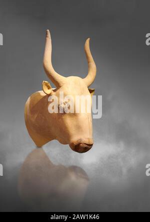 Minoan  bull's head rhython libation vessel, Phaistos palace 1700-1600 BC; Heraklion Archaeological  Museum, grey background. Stock Photo