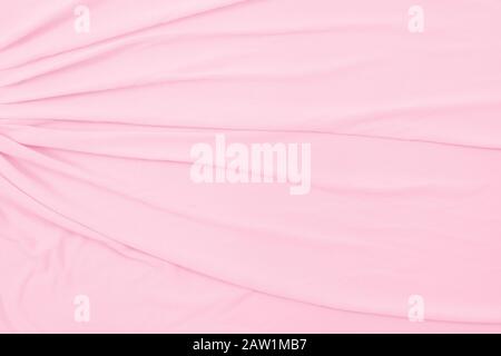 Abstract Soft Pink Flowing Fabric Background Stock Photo