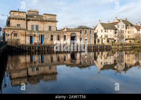 Custom House Gallery on Customs Wharf reflected in the Water of Leith in Leith, Edinburgh, Scotland, United Kingdom Stock Photo