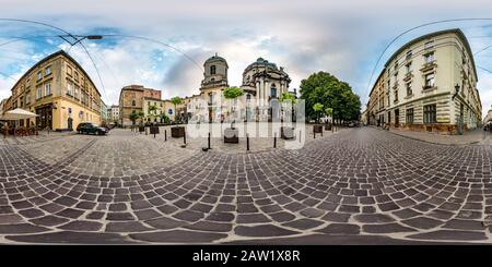 360 degree panoramic view of LVIV, UKRAINE - AUGUST 2019: Full spherical seamless hdri panorama 360 degrees near old baroque uniate Dominican Cathedral in equirectangular projecti