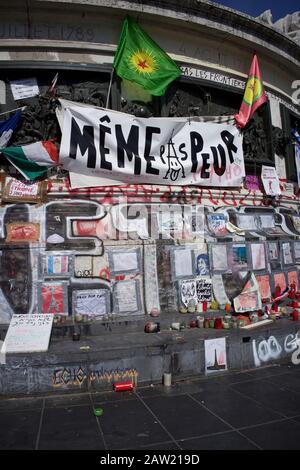 Don't be afraid banner and flags on steps of Marianne statue, after Paris terrorist attacks, Place de la République, Paris, France - April 2016 Stock Photo