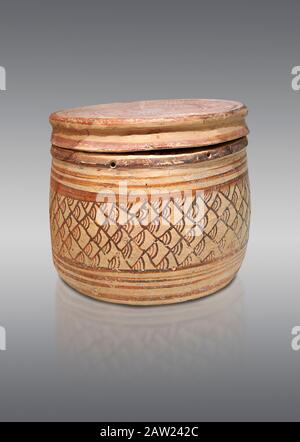 Minoan Cretan decorated pot with lid , Knossos-Venizeleio 1300-1200 BC, Heraklion Archaeological Museum, grey background Stock Photo