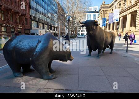 Bull and Bear sculptures in front of the stock exchange Building in Frankfurt Germany. Stock Photo