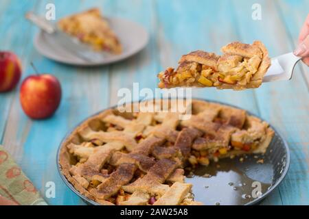 Home-baked lattice apple pie, in a baking dish. Stock Photo
