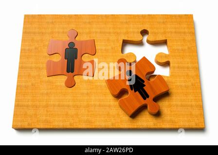 Incomplete Jigsaw puzzle with male and female pieces, gender or relationship concept Stock Photo