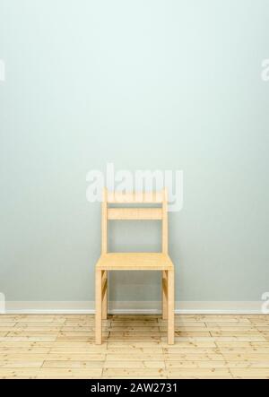 Wooden chair in an empty room with a wooden floor Stock Photo