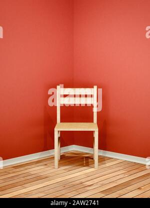 Wooden chair in the corner of an empty room Stock Photo