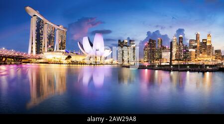 Singapore sunset city skyline at business district, Marina Bay Stock Photo