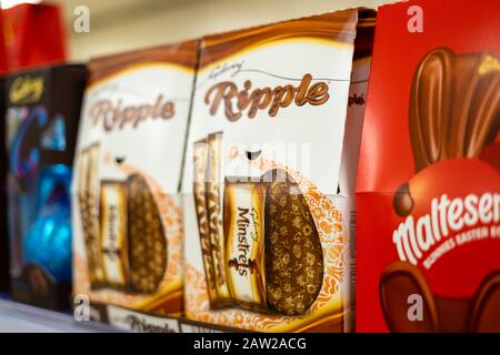 Various Easter eggs on the shelf in a supermarket or shop Stock Photo