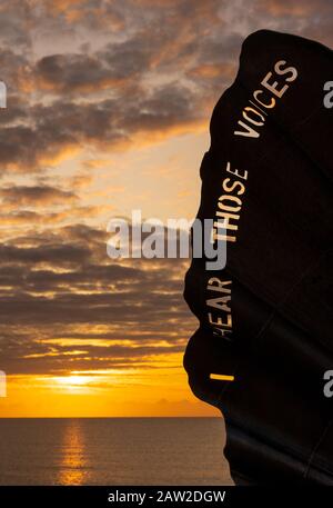 Sunrise at the Scallop on Aldeburgh beach. Suffolk. UK Stock Photo