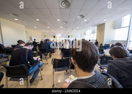 Students in class during a lecture Stock Photo